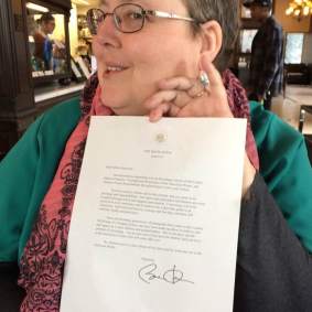 The welcome note with President Obama's signature!